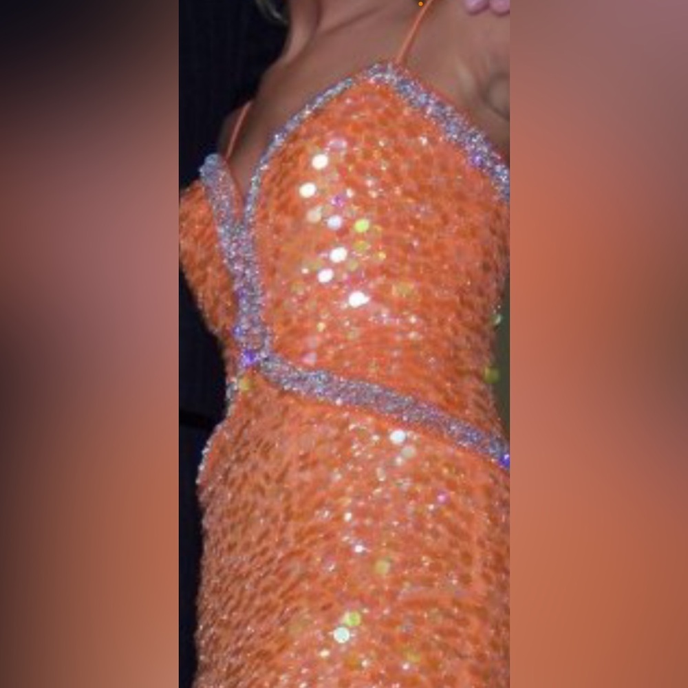 Beautiful beaded, coral prom, dress, fitted at waist, spaghetti straps.